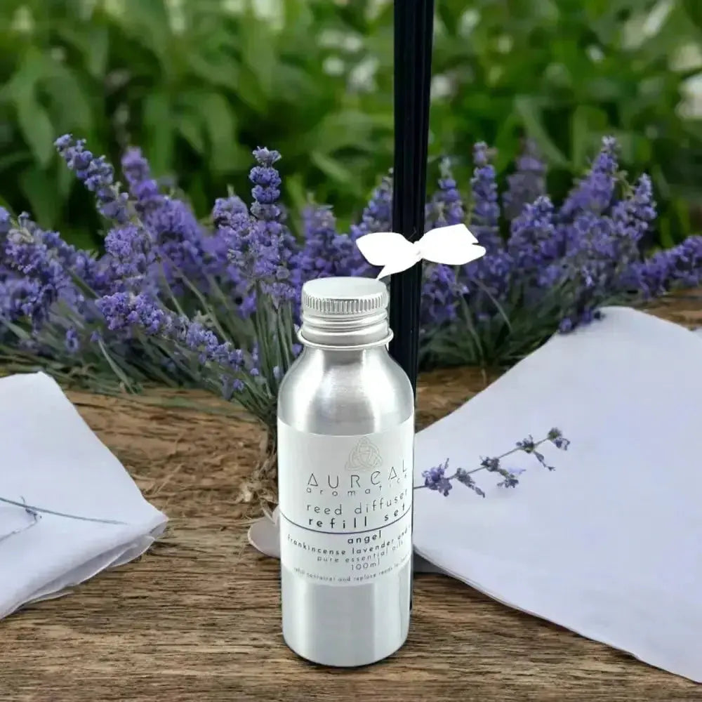 Aureal Angel reed diffuser refill bottle beside lavender flowers