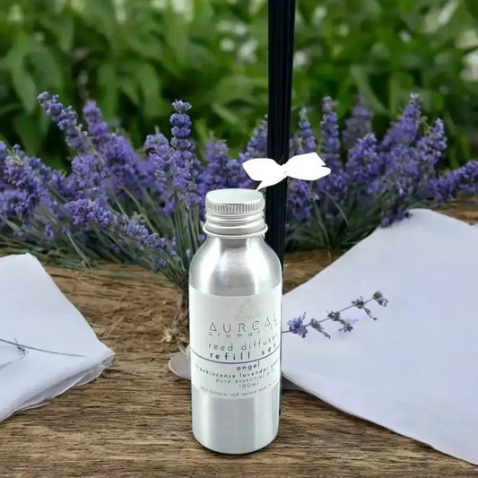 Aureal Angel reed diffuser refill bottle beside lavender flowers