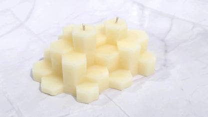 Cream beeswax Giant's Causeway candle made of stacked hexagon columns