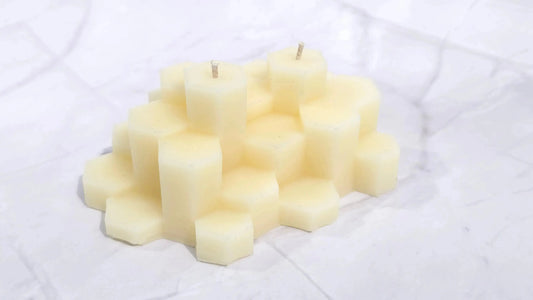 Cream beeswax Giant's Causeway candle made of stacked hexagon columns