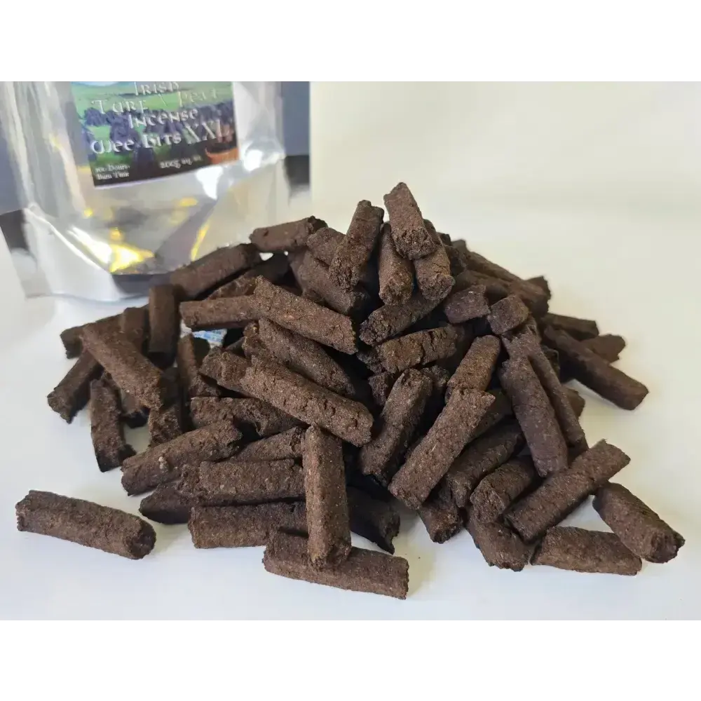 Pile of small turf incense pieces in front of a silver Wee Bits bag