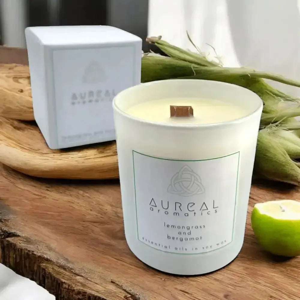 Aureal lemongrass and bergamot candle in a white glass with a wooden wick and its box
